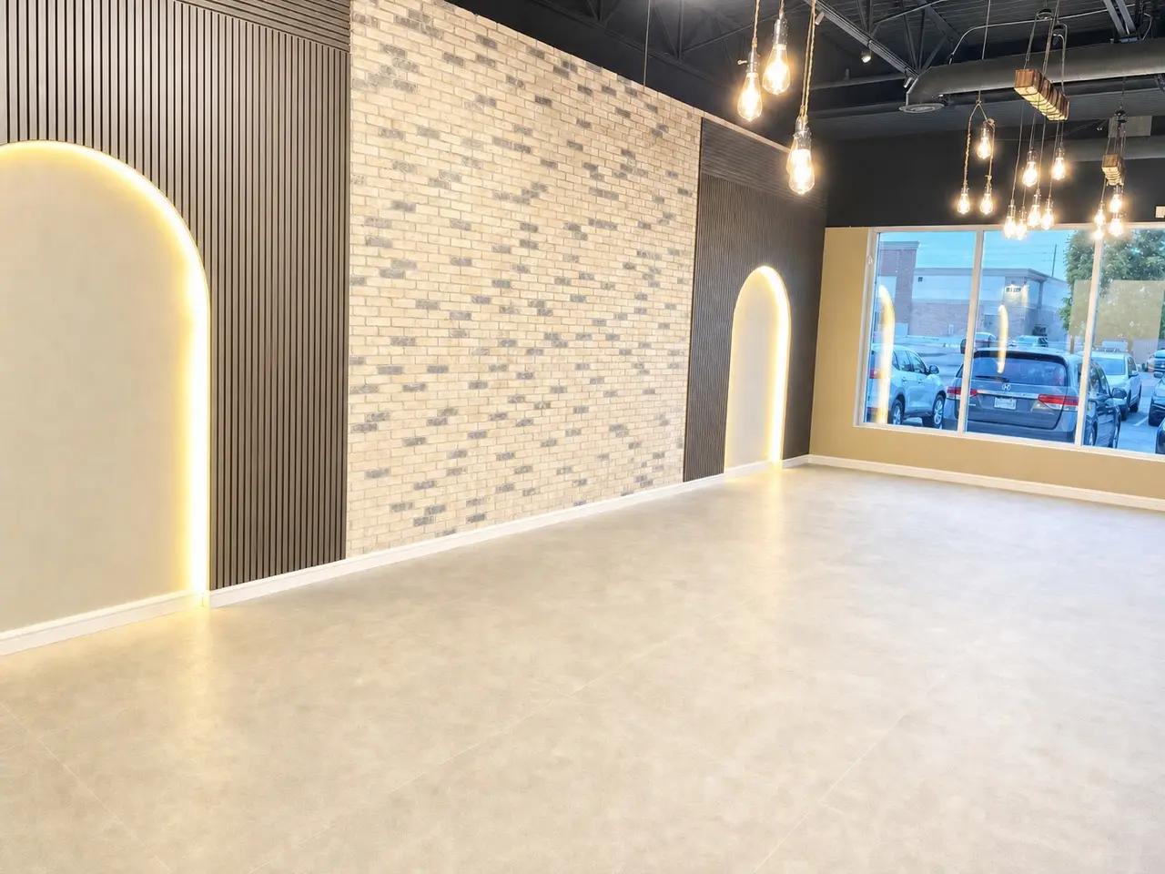 Commercial renovation interior with brick arch